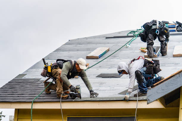 Professional Roofing technician working in Harwick, PA